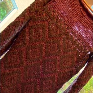 Beautiful warm cozy sweater for the winter sitting by the fire in good condition